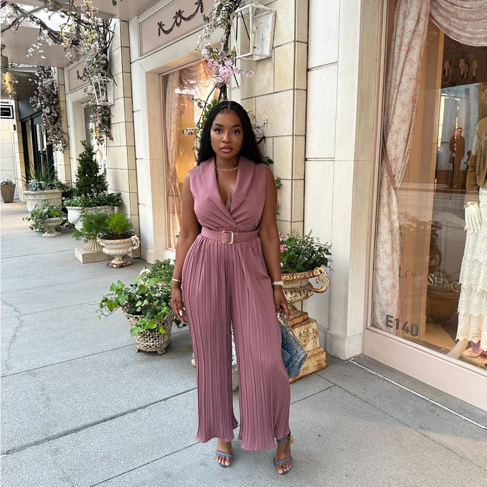 Dress up this deep purple jumpsuit